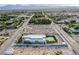 Newly constructed modern home displays its backyard pool, sleek design, and landscaping, amidst a developing area at 5400 Mello Ave, Las Vegas, NV 89131