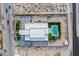 Aerial view showing the architectural design, garden, parking and pool of a modern home under construction at 5400 Mello Ave, Las Vegas, NV 89131