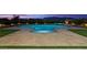 Beautiful backyard featuring a sparkling pool, luxurious patio, and landscaping, perfect for outdoor entertaining at 5400 Mello Ave, Las Vegas, NV 89131
