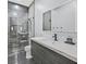 Modern bathroom features a glass-enclosed shower and stylish vanity with sleek hardware at 5400 Mello Ave, Las Vegas, NV 89131