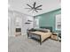 The spacious bedroom features a modern bed frame, a fan, and ample natural light at 5400 Mello Ave, Las Vegas, NV 89131