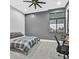 Contemporary bedroom design features large windows, carpeted floors, and a modern ceiling fan at 5400 Mello Ave, Las Vegas, NV 89131