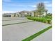 Stunning modern home featuring a desert landscape and a long driveway at 5400 Mello Ave, Las Vegas, NV 89131