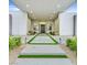 A modern home with a well-manicured entrance and minimalist landscaping at 5400 Mello Ave, Las Vegas, NV 89131