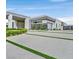 Modern home with beautiful landscaping and a spacious driveway at 5400 Mello Ave, Las Vegas, NV 89131