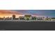Elegant modern home featuring desert landscaping and a gated entrance at 5400 Mello Ave, Las Vegas, NV 89131
