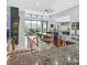 Luxurious living area with a sleek bar, modern finishes, and expansive outdoor views at 5400 Mello Ave, Las Vegas, NV 89131