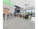 Open concept living room with bar and modern decor, creating an inviting space at 5400 Mello Ave, Las Vegas, NV 89131