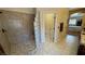Bathroom featuring tiled shower with glass blocks in a neutral color at 5480 Lincolnwood Ct, Pahrump, NV 89061