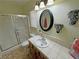 Bathroom featuring a vanity, shower and tile floors at 5480 Lincolnwood Ct, Pahrump, NV 89061