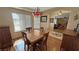 Bright dining room with decorative chandelier and warm tones at 5480 Lincolnwood Ct, Pahrump, NV 89061