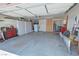 Spacious garage with ample storage, tool chests, and plenty of room for parking at 5480 Lincolnwood Ct, Pahrump, NV 89061