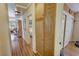 Hallway leading to a bedroom, wood cabinet on the right at 5480 Lincolnwood Ct, Pahrump, NV 89061
