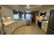 Spacious updated kitchen with white cabinets, marble countertops, and stainless steel appliances at 5480 Lincolnwood Ct, Pahrump, NV 89061