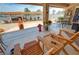Spacious patio with outdoor seating, a charming fireplace, and ample room for gatherings and relaxation at 5480 Lincolnwood Ct, Pahrump, NV 89061