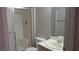 Bathroom featuring a shower with sliding glass doors, neutral walls, toilet, and vanity with sink at 5710 E Tropicana Ave # 1114, Las Vegas, NV 89122