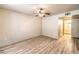 Empty bedroom features laminate wood flooring and an ensuite bathroom at 5710 E Tropicana Ave # 1114, Las Vegas, NV 89122