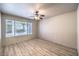 Bedroom with a large window and a ceiling fan at 5710 E Tropicana Ave # 1114, Las Vegas, NV 89122