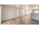 Spacious living room with plenty of natural light and modern laminate flooring at 5710 E Tropicana Ave # 1114, Las Vegas, NV 89122