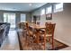Well lit Dining area with view of living room and backyard access at 5854 Olivine Falls Ave, Las Vegas, NV 89130