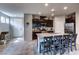 Well-equipped kitchen with granite countertops, stainless steel appliances, and ample cabinet space at 5854 Olivine Falls Ave, Las Vegas, NV 89130