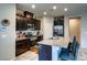 Well-equipped kitchen with granite countertops, stainless steel appliances, and ample cabinet space at 5854 Olivine Falls Ave, Las Vegas, NV 89130