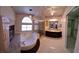 Lovely primary bathroom with granite countertops, soaking tub, shower, and a walk-in closet at 6 High Sierra Dr, Henderson, NV 89074