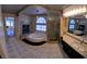 Luxurious primary bathroom features a soaking tub, shower, fireplace, and granite countertops at 6 High Sierra Dr, Henderson, NV 89074