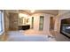 Bright primary bathroom with granite countertops, soaking tub, shower, fireplace and closet at 6 High Sierra Dr, Henderson, NV 89074