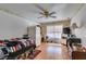 Bedroom with wood floors, ceiling fan, and natural light from the window at 6 High Sierra Dr, Henderson, NV 89074