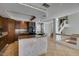 This eat-in kitchen boasts recessed lighting, granite counters, and light tile floors at 6 High Sierra Dr, Henderson, NV 89074