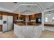 Bright kitchen showcases granite counters, recessed lights, and stainless steel appliances at 6 High Sierra Dr, Henderson, NV 89074