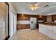 Eat-in kitchen features stainless steel appliances, ample storage, and sliding doors for indoor-outdoor dining at 6 High Sierra Dr, Henderson, NV 89074
