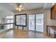 Sunlit eat-in kitchen offering backyard views, access to outdoor deck/pool area, and stylish finishes at 6 High Sierra Dr, Henderson, NV 89074