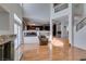 Spacious living room featuring a fireplace, seamless access to the kitchen, and plenty of natural light at 6 High Sierra Dr, Henderson, NV 89074