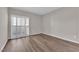 Empty bedroom with wood floors and window shutters for privacy at 6480 Annie Oakley Dr # 112, Las Vegas, NV 89120