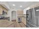 Well-equipped kitchen with stainless steel appliances and light wood cabinets, offering a functional and stylish space at 6480 Annie Oakley Dr # 112, Las Vegas, NV 89120