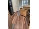 Open kitchen features a refrigerator, range and granite countertops at 6480 Annie Oakley Dr # 112, Las Vegas, NV 89120
