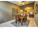 Dining room with an arched ceiling, tile floors, and natural lighting at 6712 Tattler Dr, North Las Vegas, NV 89084