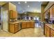 Well-equipped kitchen with light wood cabinets and countertops, and stainless steel appliances at 6712 Tattler Dr, North Las Vegas, NV 89084