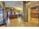 Bright living room with tile floors, ceiling fan, and dining area at 6712 Tattler Dr, North Las Vegas, NV 89084
