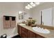 Bathroom with a double vanity, attractive countertop, and decorative accents at 6739 Quapaw St, Las Vegas, NV 89149