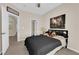 Cozy bedroom featuring natural light, comfortable bed, and decor at 6739 Quapaw St, Las Vegas, NV 89149