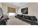 Stylish bedroom featuring a comfortable sofa and modern decor at 6739 Quapaw St, Las Vegas, NV 89149