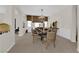 Formal dining room features a large table, chandelier, and wainscoting at 6739 Quapaw St, Las Vegas, NV 89149