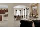 Elegant dining room with stylish table setting, sophisticated decor, and a view into the kitchen at 6739 Quapaw St, Las Vegas, NV 89149