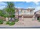 Charming two-story home with a two-car garage and landscaped front yard at 6739 Quapaw St, Las Vegas, NV 89149