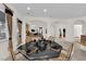 Eat-in kitchen with granite countertops and table with seating in an open floor plan at 6739 Quapaw St, Las Vegas, NV 89149