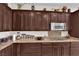 Modern kitchen featuring granite countertops and stainless steel appliances at 6739 Quapaw St, Las Vegas, NV 89149
