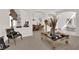 Inviting living room featuring neutral tones, stylish decor, and bright natural light at 6739 Quapaw St, Las Vegas, NV 89149